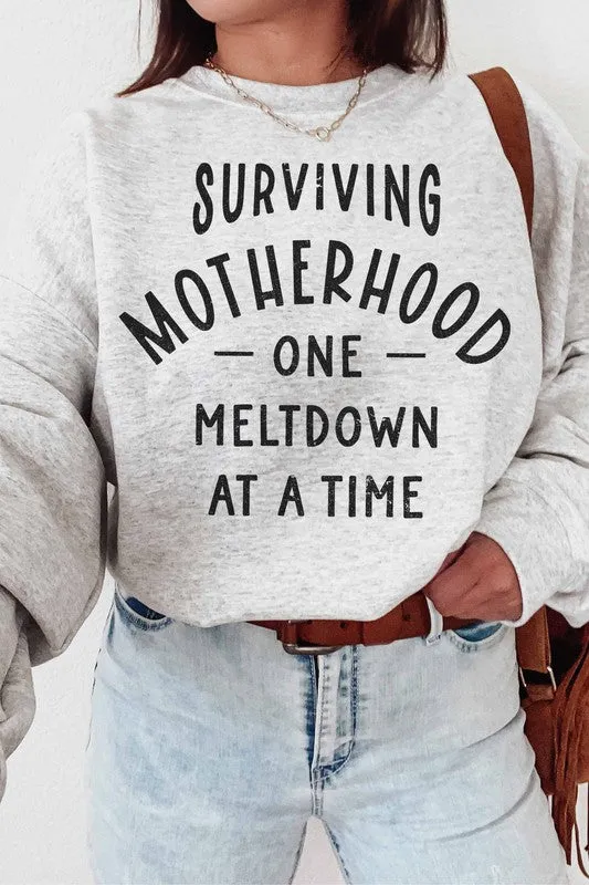 SURVIVING MOTHERHOOD GRAPHIC SWEATSHIRT