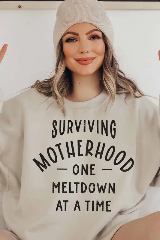 SURVIVING MOTHERHOOD GRAPHIC SWEATSHIRT