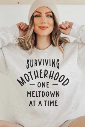 SURVIVING MOTHERHOOD GRAPHIC SWEATSHIRT