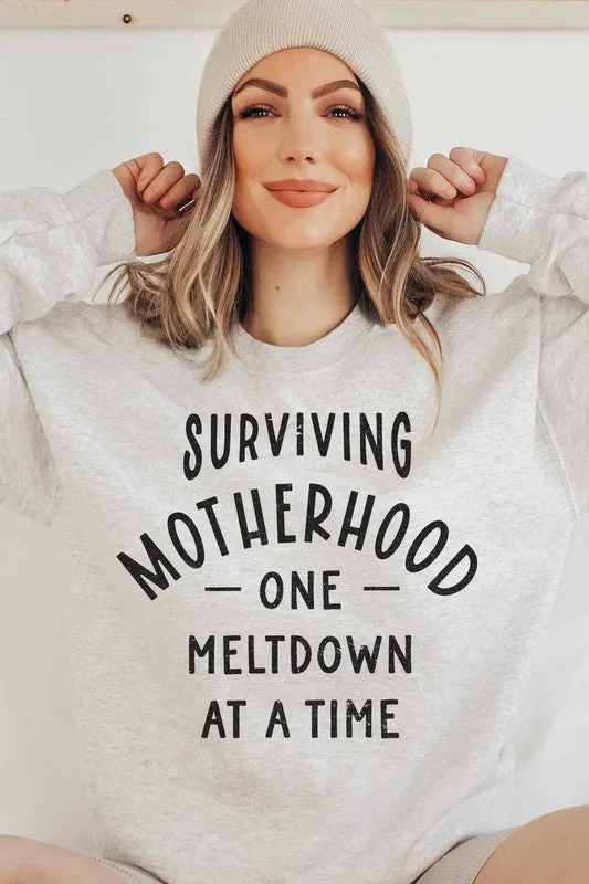 SURVIVING MOTHERHOOD GRAPHIC SWEATSHIRT