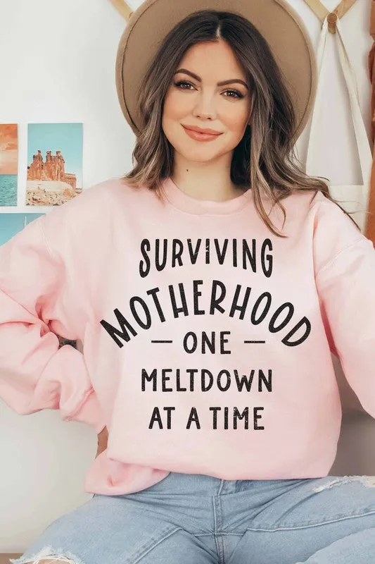 SURVIVING MOTHERHOOD GRAPHIC SWEATSHIRT
